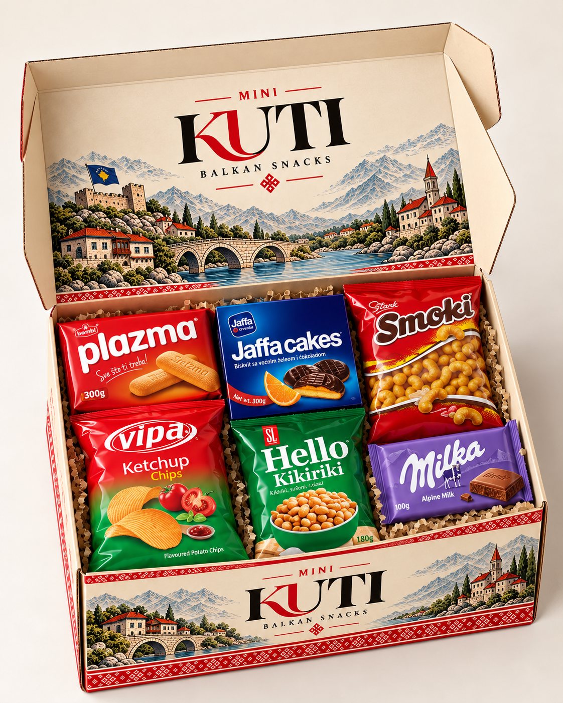 A Mini Kuti box opened and filled with Balkan snacks: Plazma, Jaffa Cakes, Smoki, Vipa Ketchup Chips, Hello Kikiriki peanuts and Milka chocolate
